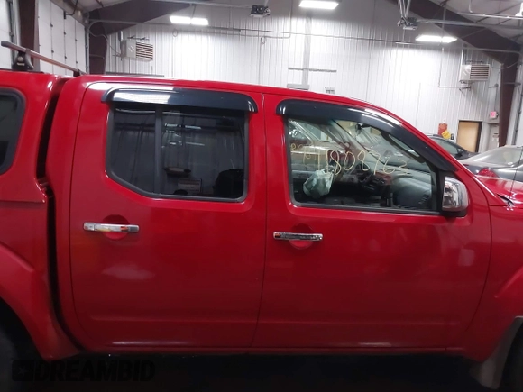 2006 Nissan Frontier SE z VIN 1N6AD07W86C401156, wystawiony jako IAAI lot #41808763 z przebiegiem 200 825 mil mil oraz . Historia ofert i sprzedaży dostępna na DreamBid. Obrazek 13.