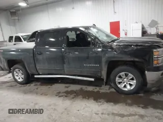 2015 Chevrolet Silverado 1500 LT with VIN 3GCUKREC4FG286409, listed as a IAAI auction lot 41150467 with 162,088 mi miles. Bid and sale history available at carsss.com. Image 13.