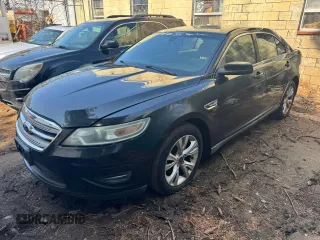 2011 Ford Taurus SEL z VIN 1FAHP2EW8BG138540, wystawiony jako Copart lot #56559815 z przebiegiem 286 211 mil mil oraz Tytuł czysty. Historia ofert i sprzedaży dostępna na DreamBid. Obrazek 2.