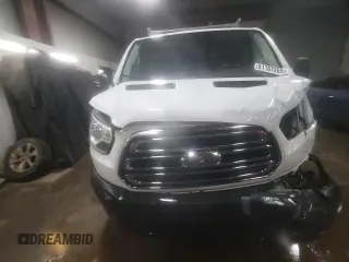 2018 Ford Transit z VIN 1FTYR1YM5JKA58794, wystawiony jako Copart lot #51187265 z przebiegiem 121 489 mil mil oraz Szkoda całkowita • Salvage title. Historia ofert i sprzedaży dostępna na DreamBid. Obrazek 14.