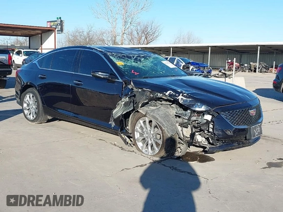 2021 Cadillac CT5 Premium Luxury z VIN 1G6DT5RW8M0100093, wystawiony jako IAAI lot #41764220 z przebiegiem 36 469 mil mil oraz . Historia ofert i sprzedaży dostępna na DreamBid. Obrazek 1.
