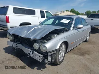 2004 Jaguar XJ 8 with VIN SAJEA71C74SG11470, listed as a IAAI auction lot 42032116 with 209,821 mi miles and . Bid and sale history available at DreamBid. Image 2.
