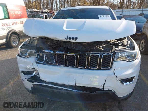2017 Jeep Grand Cherokee Laredo with VIN 1C4RJFAGXHC756562, listed as a IAAI auction lot 40793476 with 102,241 mi miles and . Bid and sale history available at DreamBid. Image 6.