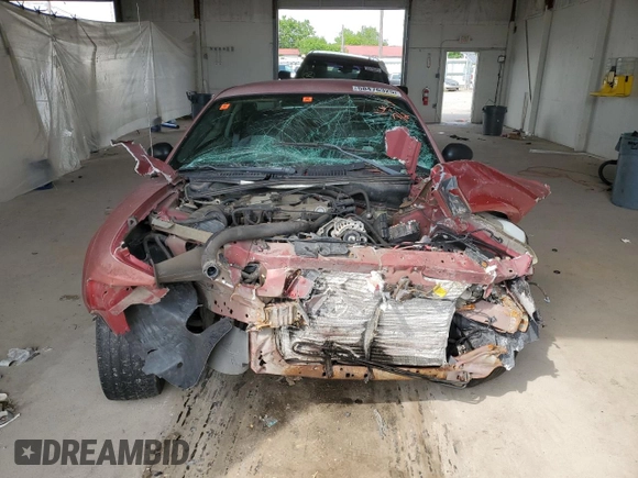 2003 Ford Mustang Standard z VIN 1FAFP40433F371497, wystawiony jako Copart lot #58476325 z przebiegiem Nie podano mil oraz Szkoda całkowita • Salvage title. Historia ofert i sprzedaży dostępna na DreamBid. Obrazek 5.