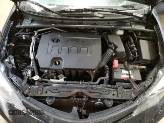 2019 Toyota Corolla L z VIN 2T1BURHE6KC152553, wystawiony jako Copart lot #61573735 z przebiegiem 102 006 mil mil oraz Szkoda całkowita • Salvage title. Historia ofert i sprzedaży dostępna na DreamBid. Obrazek 11.