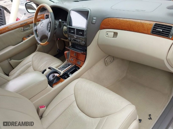 2004 Lexus LS 430 with VIN JTHBN36F940144951, listed as a IAAI auction lot 41795221 with 125,026 mi miles. Bid and sale history available at carsss.com. Image 5.