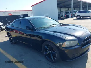 2012 Dodge Charger SXT with VIN 2C3CDXHG2CH258844, listed as a IAAI auction lot 42025908 with 214,529 mi miles. Bid and sale history available at carsss.com. Image 1.