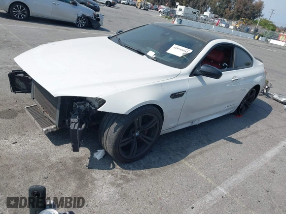 2013 BMW M6 z VIN WBSLX9C52DD159906, wystawiony jako IAAI lot #42095042 z przebiegiem 105 463 mil mil oraz . Historia ofert i sprzedaży dostępna na DreamBid. Obrazek 2.
