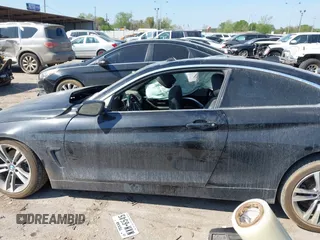2019 BMW 4 Series 430i with VIN WBA4W3C51KAG91397, listed as a IAAI auction lot 41871270 with 108,701 mi miles and . Bid and sale history available at carsss.com. Image 14.