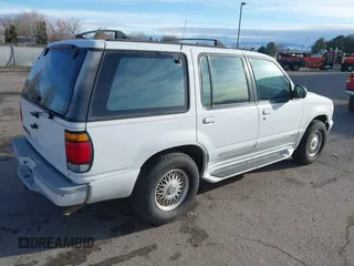1995 Ford Explorer Eddie Bauer z VIN 1FMDU34X4SZB10719, wystawiony jako IAAI lot #41808364 z przebiegiem 140 085 mil mil oraz . Historia ofert i sprzedaży dostępna na DreamBid. Obrazek 4.