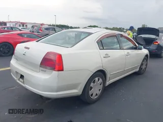 2004 Mitsubishi Galant ES z VIN 4A3AB36FX4E071031, wystawiony jako IAAI lot #42376783 z przebiegiem 145 475 mil mil oraz . Historia ofert i sprzedaży dostępna na DreamBid. Obrazek 4.
