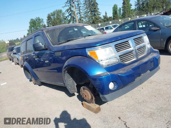 2010 Dodge Nitro SE with VIN 1D4PT2GK4AW141616, listed as a IAAI auction lot 42183953 with 128,023 mi miles. Bid and sale history available at carsss.com. Image 1.