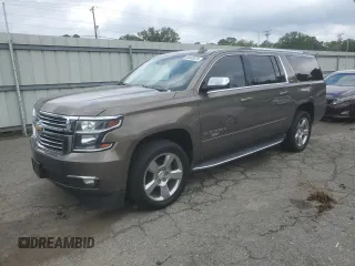 2016 Chevrolet Suburban LTZ with VIN 1GNSKJKC5GR180315, listed as a Copart auction lot 55449375 with 198,760 mi miles and Clean Title. Bid and sale history available at DreamBid. Image 1.
