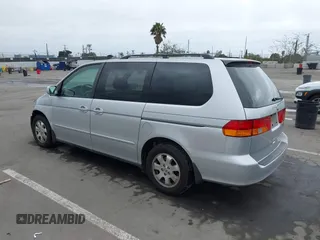 2003 Honda Odyssey EX-L with VIN 5FNRL18943B030373, listed as a IAAI auction lot 41867289 with 179,718 mi miles and . Bid and sale history available at DreamBid. Image 3.