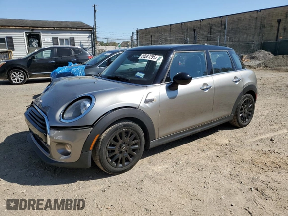 2019 MINI Hardtop 4 Door Cooper with VIN WMWXU1C52K2J02579, listed as a Copart auction lot 53507295 with 94,350 mi miles and Salvage Title. Bid and sale history available at DreamBid. Image 1.