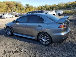 2014 Mitsubishi Lancer Evolution GSR z VIN JA32W8FV6EU018171, wystawiony jako Copart lot #77109934 z przebiegiem 83 467 mil mil oraz Tytuł czysty. Historia ofert i sprzedaży dostępna na DreamBid. Obrazek 2.