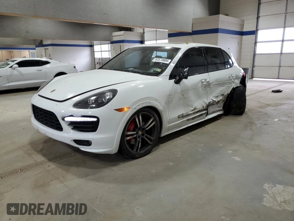 2013 Porsche Cayenne GTS with VIN WP1AD2A24DLA76344, listed as a Copart auction lot 83570884 with 63,704 mi miles and Salvage title. Bid and sale history available at DreamBid. Image 1.