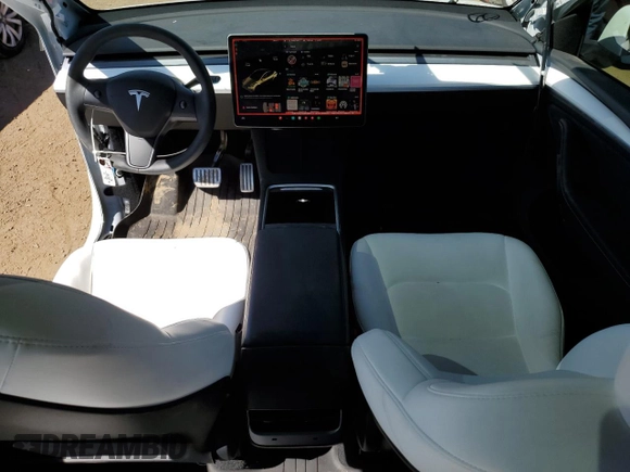 2024 Tesla Model Y Performance with VIN 7SAYGDEF6RA284171, listed as a Copart auction lot 50317205 with 6,870 mi miles and Salvage Title. Bid and sale history available at DreamBid. Image 8.