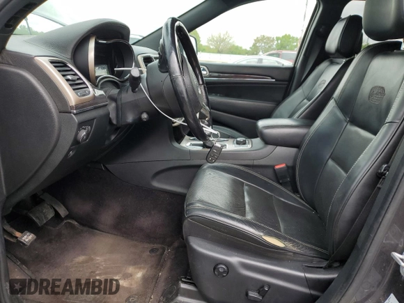 2016 Jeep Grand Cherokee Overland with VIN 1C4RJFCG6GC453399, listed as a Copart auction lot 57730005 with 181,657 mi miles and Clean title. Bid and sale history available at DreamBid. Image 7.