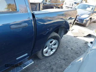 2021 Ram 1500 Tradesman z VIN 3C6RR6KG4MG711610, wystawiony jako IAAI lot #40942505 z przebiegiem 9 949 mil mil oraz . Historia ofert i sprzedaży dostępna na DreamBid. Obrazek 6.