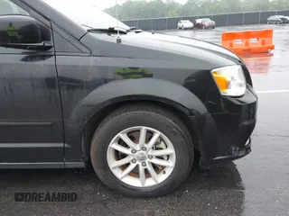 2015 Dodge Grand Caravan SXT with VIN 2C4RDGCG8FR556861, listed as a IAAI auction lot 42224948 with 110,797 mi miles and . Bid and sale history available at DreamBid. Image 12.