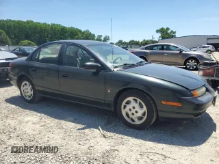 2002 Saturn SL с VIN 1G8ZK52732Z230147, выставлен на аукционе Copart как лот 57053055 с пробегом 168 612 миль миль и Чистый • Clean title. История ставок и продаж доступна на DreamBid. Изображение 4.