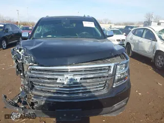2015 Chevrolet Tahoe LTZ with VIN 1GNSKCKC5FR115779, listed as a IAAI auction lot 41538240 with 155,271 mi miles. Bid and sale history available at carsss.com. Image 13.