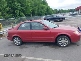 2002 Mazda Protege DX z VIN JM1BJ225821586258, wystawiony jako IAAI lot #42366064 z przebiegiem 167 332 mil mil oraz . Historia ofert i sprzedaży dostępna na DreamBid. Obrazek 13.