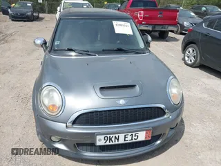 2007 MINI Hardtop S with VIN WMWMF73567TT82315, listed as a IAAI auction lot 42081321 with 123,072 mi miles and . Bid and sale history available at DreamBid. Image 6.