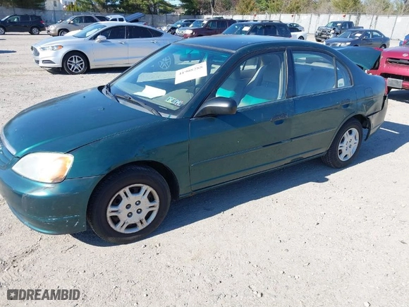 2001 Honda Civic LX with VIN 2HGES16551H567764, listed as a IAAI auction lot 41908288 with 137,740 mi miles. Bid and sale history available at carsss.com. Image 2.