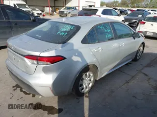 2025 Toyota Corolla LE with VIN 5YFB4MDE0SP235047, listed as a IAAI auction lot 41857041 with 6,980 mi miles. Bid and sale history available at carsss.com. Image 4.