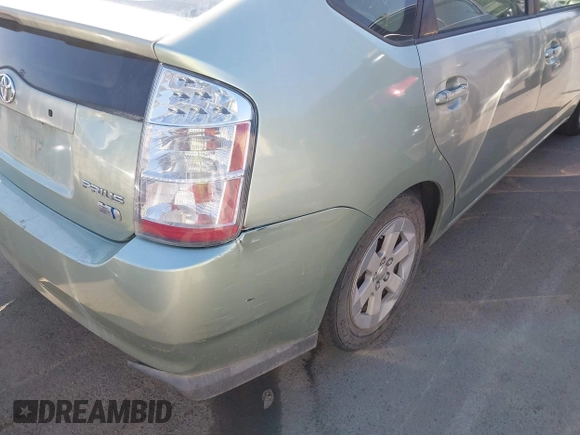 2007 Toyota Prius z VIN JTDKB20U973221624, wystawiony jako IAAI lot #42484947 z przebiegiem 257 311 mil mil oraz . Historia ofert i sprzedaży dostępna na DreamBid. Obrazek 14.