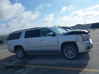 2015 GMC Yukon XL SLT z VIN 1GKS2HKCXFR618783, wystawiony jako IAAI lot #42081053 z przebiegiem 230 368 mil mil oraz . Historia ofert i sprzedaży dostępna na DreamBid. Obrazek 14.