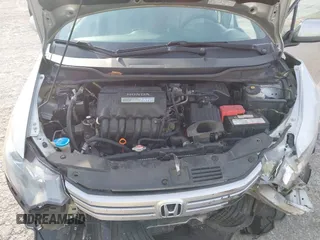 2010 Honda Insight LX with VIN JHMZE2H55AS039854, listed as a IAAI auction lot 42086147 with 153,555 mi miles and . Bid and sale history available at DreamBid. Image 10.
