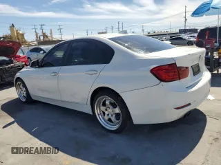 2014 BMW 3 Series 328i with VIN WBA3C1C56EK108374, listed as a Copart auction lot 52902485 with 136,407 mi miles and Salvage Title. Bid and sale history available at carsss.com. Image 2.
