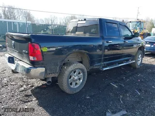 2014 Ram 2500 SLT with VIN 3C6UR5DLXEG280609, listed as a IAAI auction lot 41753347 with 167,000 mi miles. Bid and sale history available at carsss.com. Image 4.