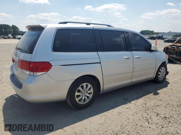 2010 Honda Odyssey EX with VIN 5FNRL3H47AB022393, listed as a Copart auction lot 61956845 with 317,023 mi miles and Salvage title. Bid and sale history available at DreamBid. Image 3.