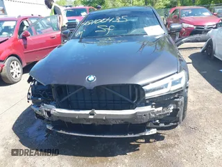 2021 BMW 5 Series 530i xDrive with VIN WBA13BJ0XMWX00677, listed as a IAAI auction lot 42100435 with 66,140 mi miles and . Bid and sale history available at DreamBid. Image 6.