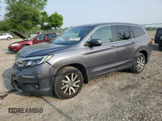 2022 Honda Pilot EX-L with VIN 5FNYF6H59NB020986, listed as a Copart auction lot 59500435 with 59,786 mi miles and Salvage title. Bid and sale history available at DreamBid. Image 1.