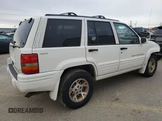 1998 Jeep Grand Cherokee Limited with VIN 1J4GZ78Y5WC259043, listed as a Copart auction lot 43976955 with 212,910 mi miles and Salvage Title. Bid and sale history available at carsss.com. Image 3.