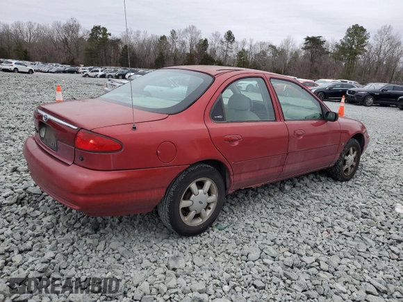 2000 Ford Contour z VIN 3FAFP6635YM116450, wystawiony jako Copart lot #44007405 z przebiegiem 361 094 mil mil oraz Szkoda całkowita • Salvage title. Historia ofert i sprzedaży dostępna na DreamBid. Obrazek 3.