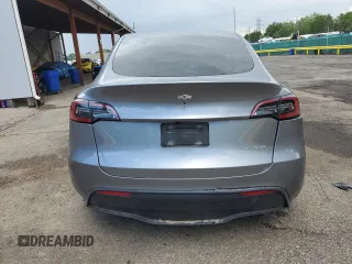 2024 Tesla Model Y Long Range с VIN 7SAYGDEE1RF161579, выставлен на аукционе Copart как лот 59901495 с пробегом 38 556 миль миль и Списание • Salvage title. История ставок и продаж доступна на DreamBid. Изображение 6.