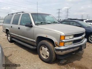 1999 Chevrolet Suburban with VIN 1GNFK16RXXJ458740, listed as a Copart auction lot 65869174 with 200,965 mi miles and Clean Title. Bid and sale history available at carsss.com. Image 4.