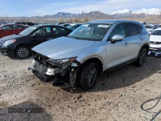 2020 Mazda CX-5 Touring with VIN JM3KFBCMXL0767254, listed as a Copart auction lot 52189335 with 96,922 mi miles and Salvage Title. Bid and sale history available at carsss.com. Image 1.