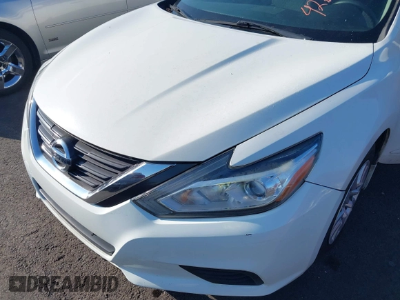 2016 Nissan Altima S with VIN 1N4AL3AP9GN355504, listed as a IAAI auction lot 42631887 with 122,957 mi miles and . Bid and sale history available at DreamBid. Image 6.
