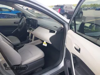 2024 Toyota Corolla Cross L with VIN 7MUAAAAG2RV116884, listed as a IAAI auction lot 42288475 with 10,539 mi miles and . Bid and sale history available at DreamBid. Image 5.