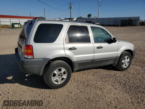 2003 Ford Escape XLT Popular 2 with VIN 1FMYU93123KD17718, listed as a Copart auction lot 74043074 with 347,585 mi miles and Clean Title. Bid and sale history available at carsss.com. Image 3.