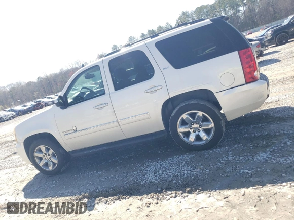 2012 GMC Yukon SLT with VIN 1GKS1CE0XCR230343, listed as a Copart auction lot 45498515 with 229,224 mi miles and Salvage Title. Bid and sale history available at carsss.com. Image 2.