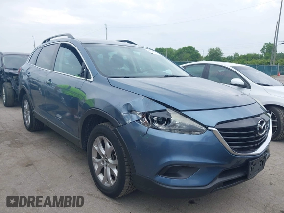 2015 Mazda CX-9 Touring with VIN JM3TB3CV9F0463819, listed as a IAAI auction lot 42506237 with 207,418 mi miles and . Bid and sale history available at DreamBid. Image 1.