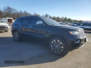 2017 Jeep Grand Cherokee Overland with VIN 1C4RJFCT9HC822898, listed as a Copart auction lot 86567034 with 120,699 mi miles and Salvage Title. Bid and sale history available at carsss.com. Image 4.